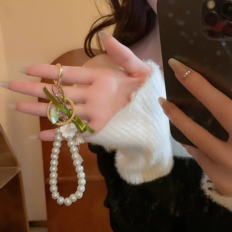 Fresh And Elegant Bell Orchid Keychain For Women Green Sweet Imitation Pearl Leatherresin Alloy Keychain Jewelry Accessory Gifts