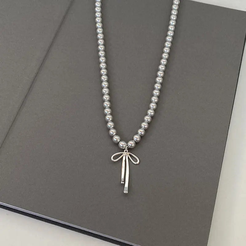 Bowknot Pearl Choker Necklace – Graceful Pendant with Gray Pearls
