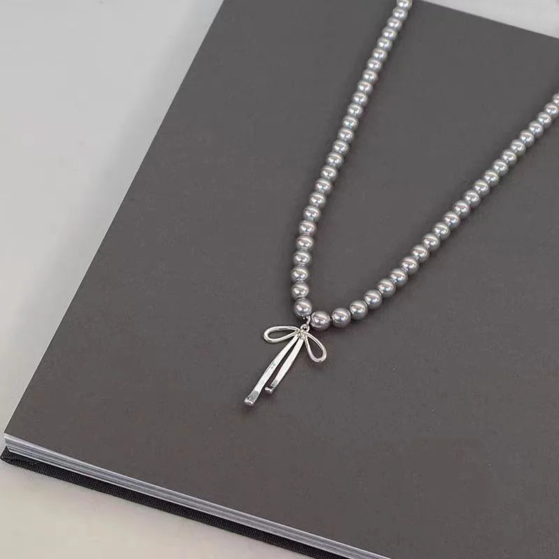 Bowknot Pearl Choker Necklace – Graceful Pendant with Gray Pearls