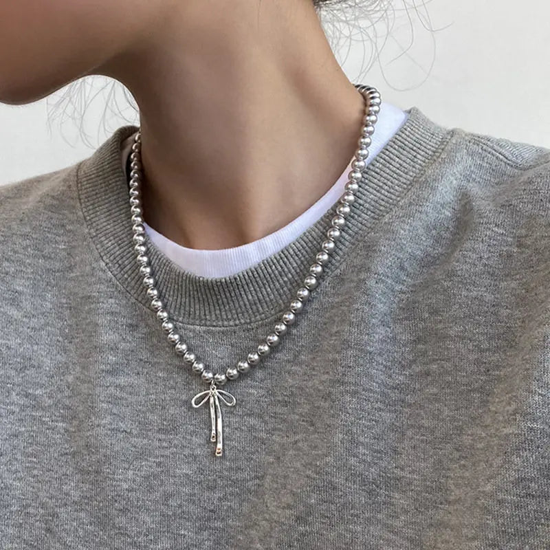 Bowknot Pearl Choker Necklace – Graceful Pendant with Gray Pearls